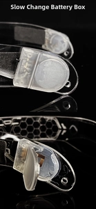 Detail view of the slow-changing LED glasses battery compartment for CR2032 button cells