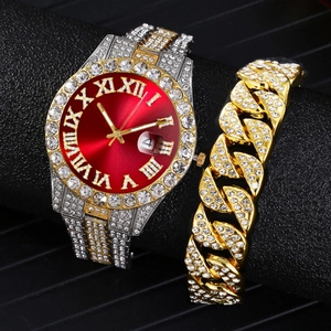 Macro shot of hip hop watch with red dial, Roman numerals and iced out Cuban link bracelet