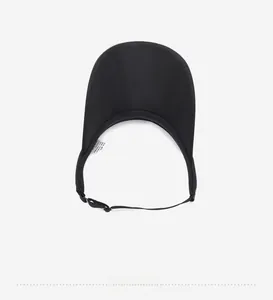 Detail view of black sun visor interior with breathable mesh lining and adjustable strap