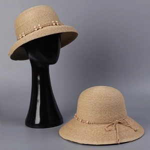 Elegant Raffia straw hat for women featuring a stylish lampshade design and bead details
