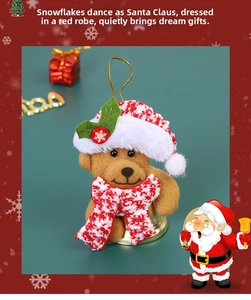 Detail of Christmas plush bear ornament with red knit hat, scarf and golden bell