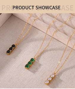 Three-stone pendant necklaces in gold steel with black, green, and clear cubic zirconia
