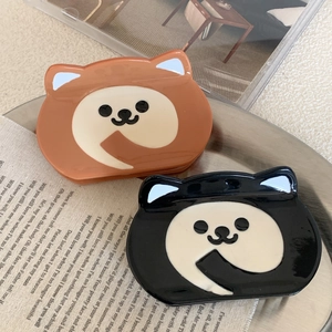 Cute acetate dog-shaped hair claws in brown and black colors for stylish hair styling
