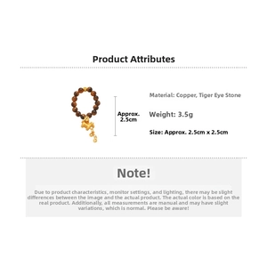 Detailed view of Tiger Eye stone beads ring featuring a golden zodiac horse pendant charm