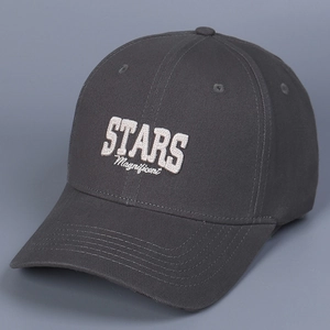 Detailed embroidery of STARS Magnificent on a charcoal grey cotton baseball cap