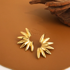 Exaggerated 18K gold petal stud earrings with a polished irregular leaf design