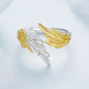 Adjustable S925 sterling silver wing ring featuring two-tone gold and silver feather texture