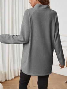 Rear view of grey maternity sweatshirt showing curved hem and loose fit styling