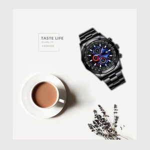 Men's business watch with black steel band and blue dial in a professional setting
