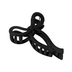 Elegant black matte bow-shaped shark hair claw clip for women's bun hairstyles