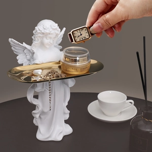 European vintage angel sculpture with gold metal tray for home entry and jewelry storage