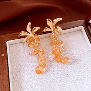 Boucles d'oreilles vintage fleurs dorées avec glands en cristal ambre et coffret