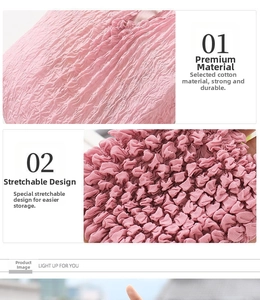 Detailed macro view of pink elastic bubble fabric texture with expandable pleated cotton design