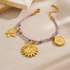 Bohemian braided rope bracelet with golden sun and moon stainless steel charms