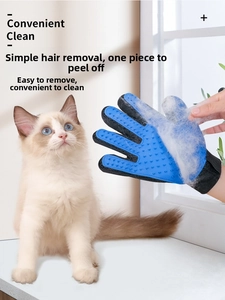 Detail showing pet grooming glove removing a whole layer of loose fur from a cat