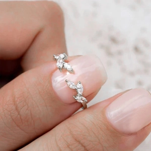 Detail of S925 silver adjustable ring with marquise-cut zircons in a leaf shape