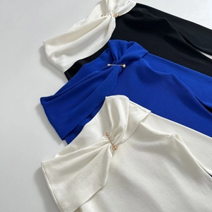 Chic off-shoulder ribbed knit tops in black, blue and white with gold metal buckle accents