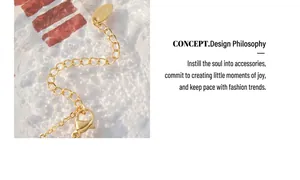 Macro view of golden chain extender with K18 engraved tag and secure lobster clasp