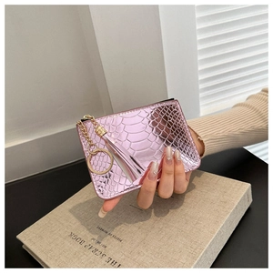 Pink metallic crocodile texture coin purse with elegant gold chain and tassel detail