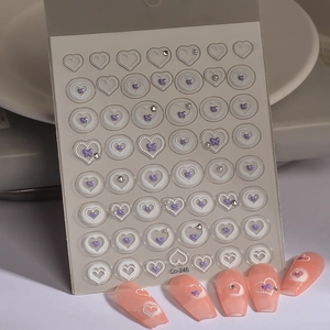 Gradient nail art decals with heart frames, purple butterflies, and 3D pearl accents