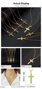 Detail showing gold cross pendant with colorful zircons and religious engraving