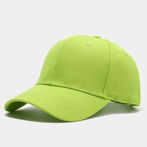 Detail view of neon green baseball cap featuring six-panel construction and curved brim