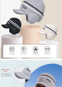 Detail view of the warm fleece lining and windproof brim of this winter knit earflap cap
