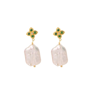 Elegant gold earrings with green gemstone and baroque freshwater pearl in floral design