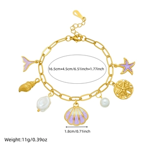 Gold stainless steel ocean charm bracelet with starfish, seashell, fish tail and pearls