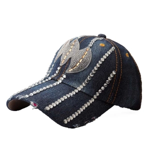 Distressed dark blue denim baseball cap with silver rhinestones and leaf-shaped metal details