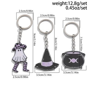 Detailed view of Halloween enamel keychains showing ghost, witch hat, and cauldron dimensions