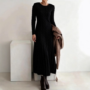 Slim fit black cable knit sweater dress with round neck and long sleeves for winter