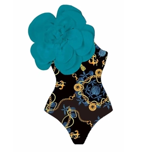 Detail of 3D turquoise floral decoration and gold anchor pattern on one-piece swimsuit