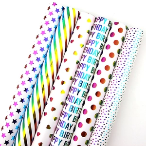 Holographic colorful birthday gift wrapping paper rolls with stripes, hearts, and dots