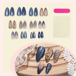 3D embossed French cat-eye press-on nails set in almond shape with gold rose accents