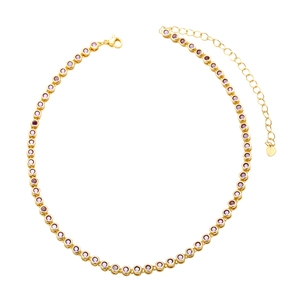 Detail of gold-plated necklace featuring purple zircons and a heart-shaped tag charm