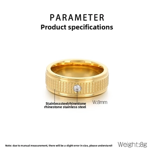 Detail view of 8mm stainless steel ring with grid pattern and single rhinestone inlay