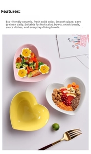 Three-piece set of heart-shaped ceramic bowls in pastel pink, yellow, and white colors