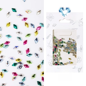 Detail of assorted crystal nail rhinestones in mix colors with retail packaging #03