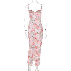 Detail of pink floral dress featuring delicate lace trim and heart-shaped neckline