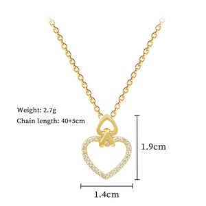 Detail view of gold heart pendant with dimensions 1.9x1.4cm and 40+5cm chain length
