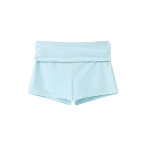 Detail of light blue loungewear shorts with pleated waistband and silver glitter lettering