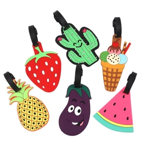 Colorful silicone luggage tags set featuring cartoon fruit and vegetable shapes with straps