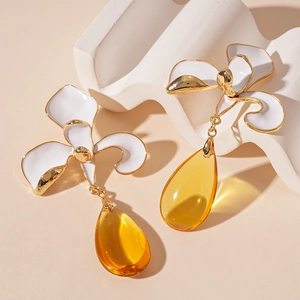Vintage orchid flower earrings with golden edges and large yellow teardrop glass pendants