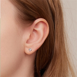 Elegant S925 sterling silver four-prong stud earrings with brilliant zircon stones