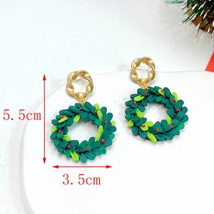 Detail view of handmade green Christmas wreath earrings with dimensions 5.5cm by 3.5cm