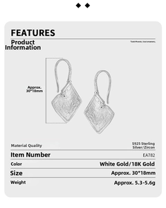Macro detail of S925 sterling silver rhombic earrings with lava texture and zircon inlay