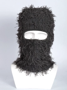 Macro detail of the fluffy long-haired plush fabric on this winter balaclava mask