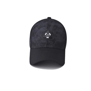 Close-up of baseball cap with gray textured camouflage pattern and silicone ROCK label