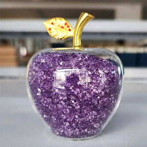 Decorative crystal apple with purple crystals inside and gold metal stem ornament
